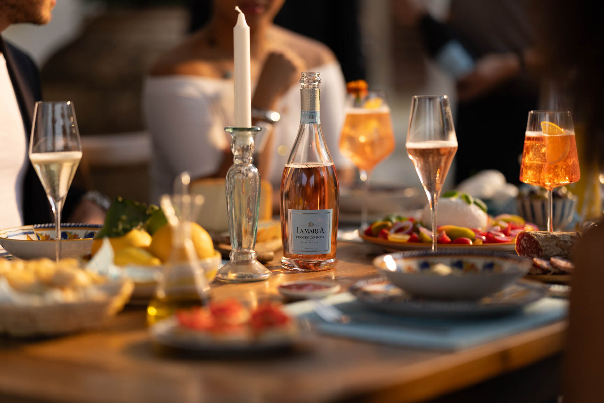 La Marca Rose on a table with food