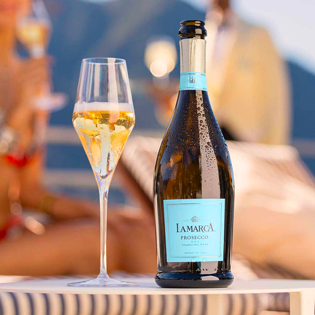 glass and bottle of La Marca Prosecco 