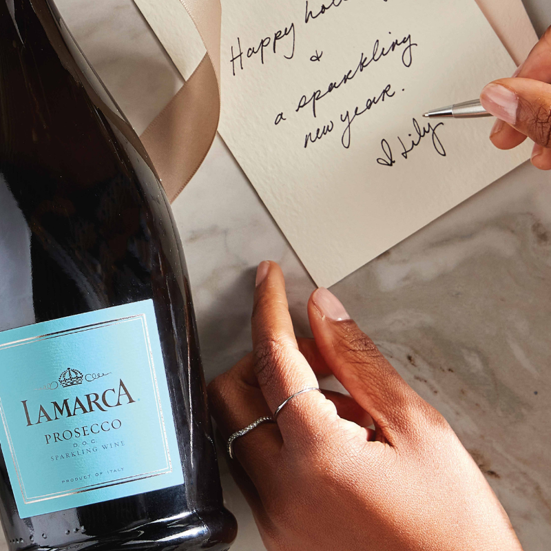 glass and bottle of La Marca Prosecco 